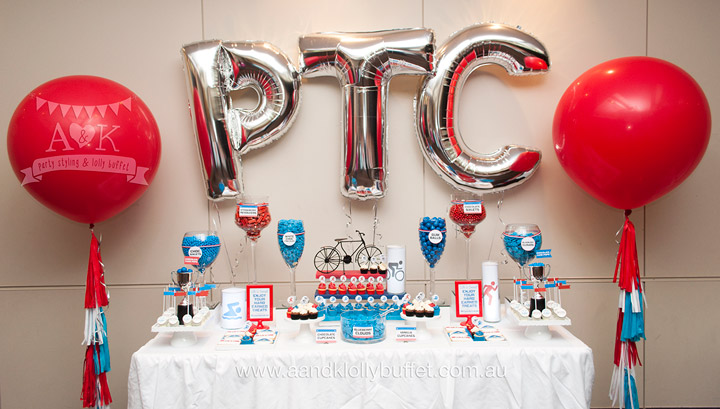 Red & Blue Triathlon themed dessert table for PTC Anniversary Ball by A&K Lolly Buffet.